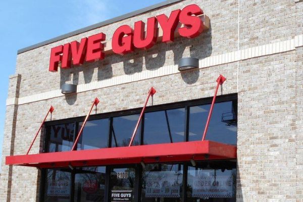Suspended metal canopy for Five Guys