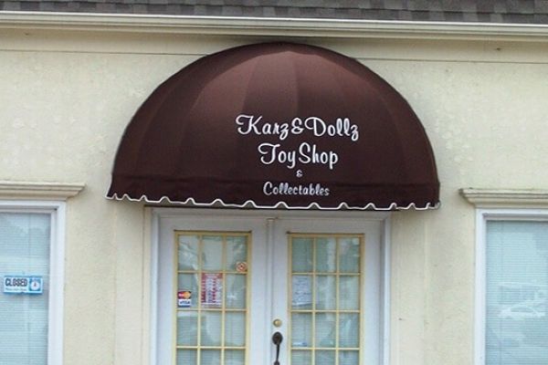 Commercial Fabric Entryway Dome Awning project for Karz and Dollz Toy Shop