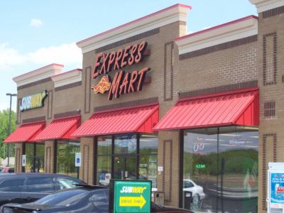 Standing seam awnings on Express Mart