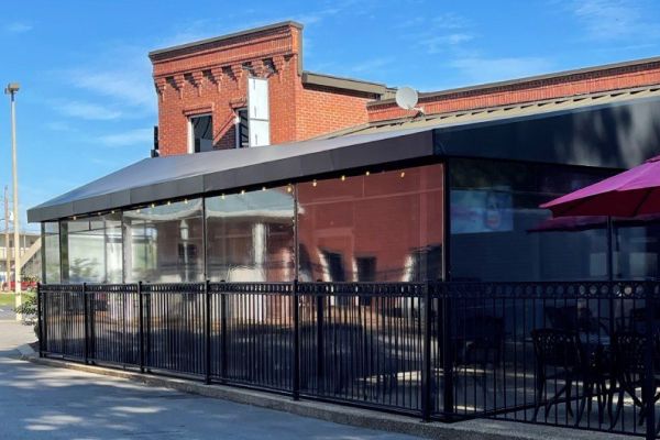 clear vinyl panels enclose restaurant patio