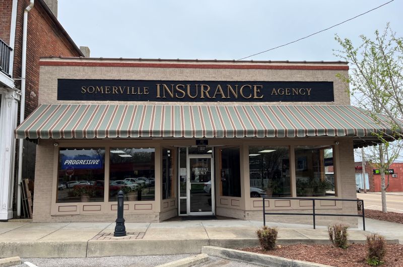 striped awning across storefront