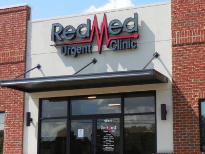 Suspended metal storefront canopy