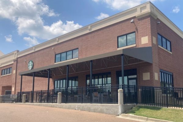 fabric canopy over outdoor seating at Kroger / Starbucks