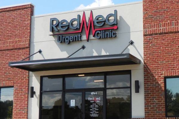Suspended metal storefront canopy